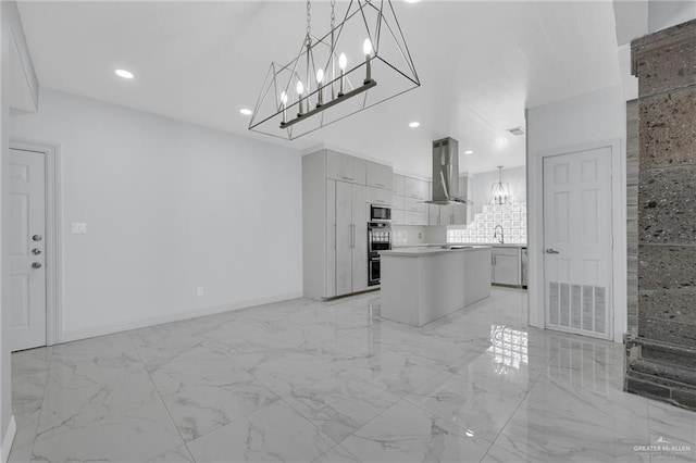 3207 E San Luis Cir, Mission, TX 78573 - kitchen featuring exhaust hood, a kitchen island, black microwave, light countertops, and double oven