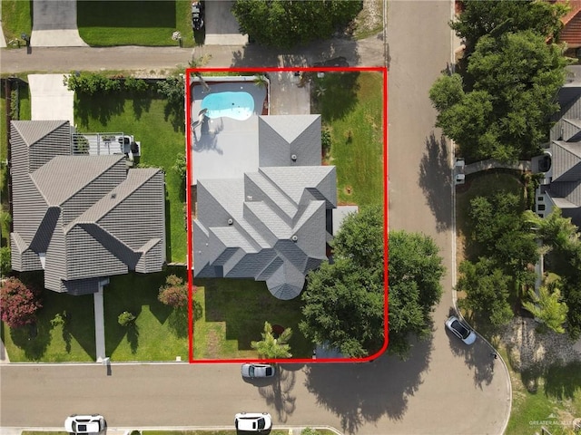 3207 E San Luis Cir, Mission, TX 78573 - aerial view of property's location with property boundaries highlighted and a pool