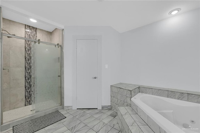 3207 E San Luis Cir, Mission, TX 78573 - bathroom featuring a tub with jets, a shower stall, and recessed lighting