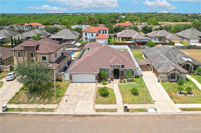 birds eye view of property with a residential view