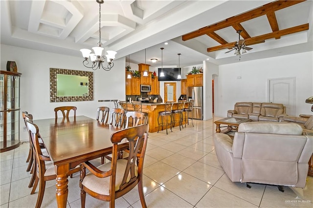 dining space featuring ceiling fan with notable chandelier, light tile patterned floors, beamed ceiling, and coffered ceiling