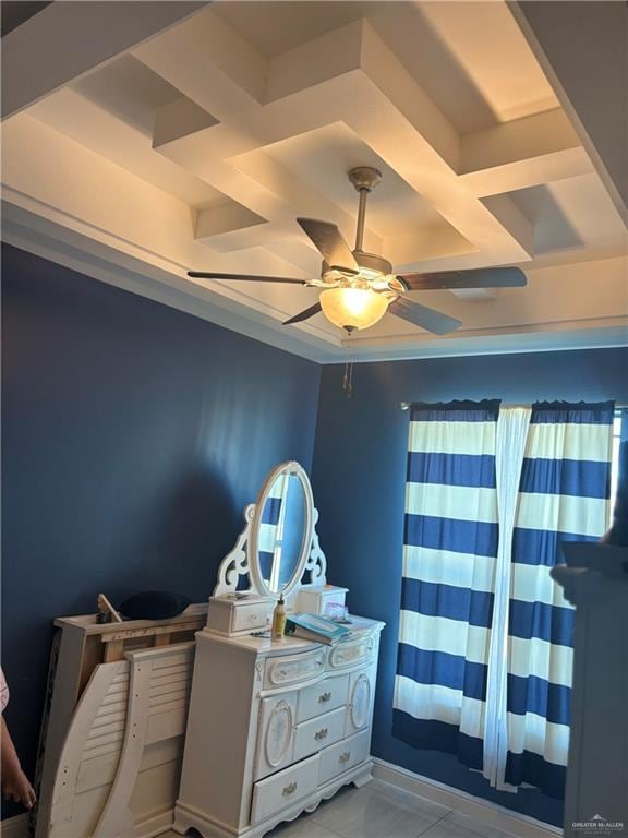 tiled bedroom featuring ceiling fan