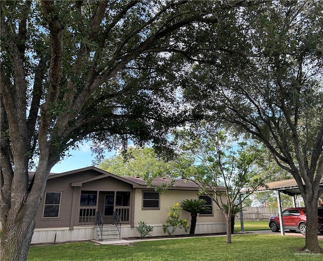 view of front of home with a front lawn