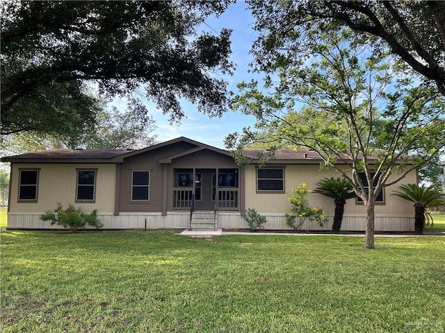 view of front of home with a front lawn