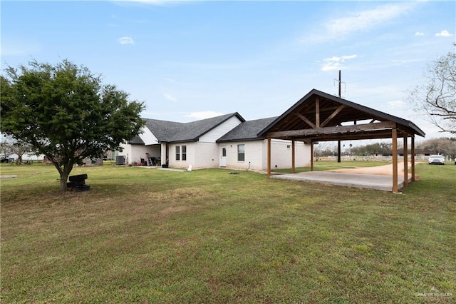 view of yard featuring a gazebo, a carport, and a patio