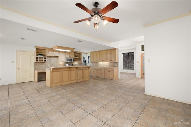 kitchen with tasteful backsplash, ceiling fan, light brown cabinets, light tile patterned floors, and a center island