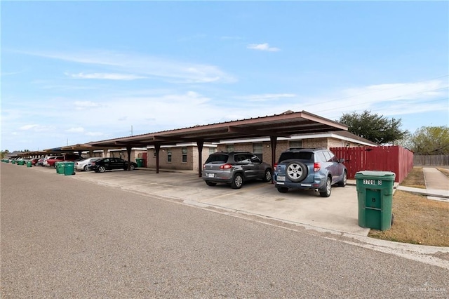 view of parking featuring a carport