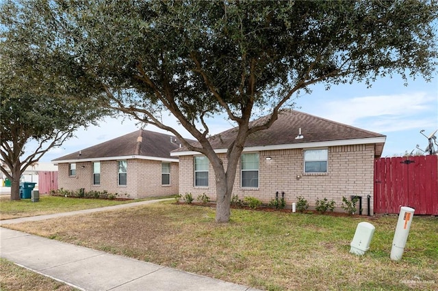 view of home's exterior with a lawn