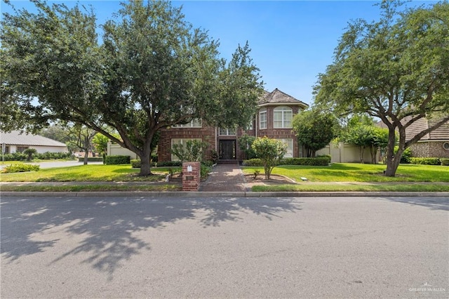 5501 N 1st Ln, Mcallen, TX 78504 - obstructed view of property with a front lawn