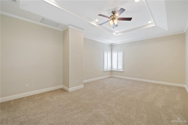 5501 N 1st Ln, Mcallen, TX 78504 - empty room with ceiling fan, crown molding, light colored carpet, baseboards, and a raised ceiling