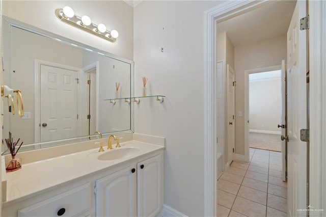 5501 N 1st Ln, Mcallen, TX 78504 - bathroom featuring tile patterned floors, vanity, and baseboards