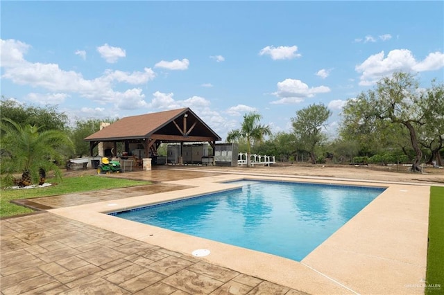 view of pool featuring a gazebo and a patio area