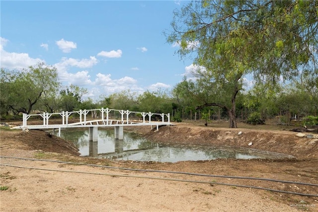 view of home's community featuring a water view