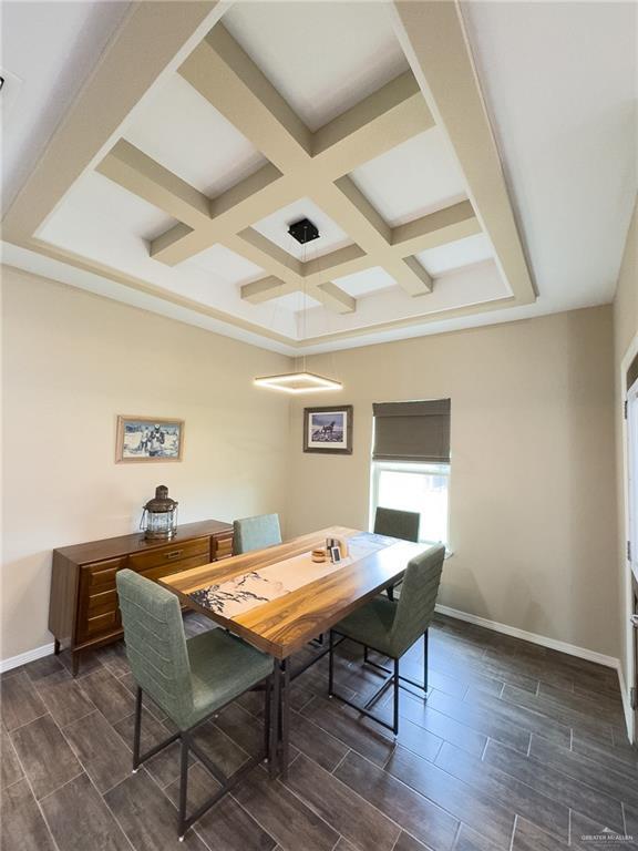 1419 Frente Al Mar Dr, Weslaco, TX 78596 - dining space with baseboards, wood tiled floor, and beam ceiling