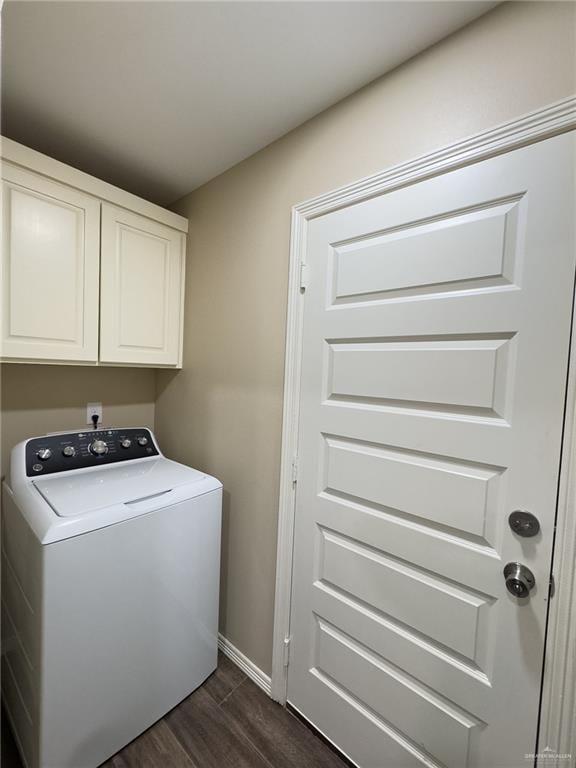 1419 Frente Al Mar Dr, Weslaco, TX 78596 - laundry area with dark wood finished floors, baseboards, washer / clothes dryer, and cabinet space