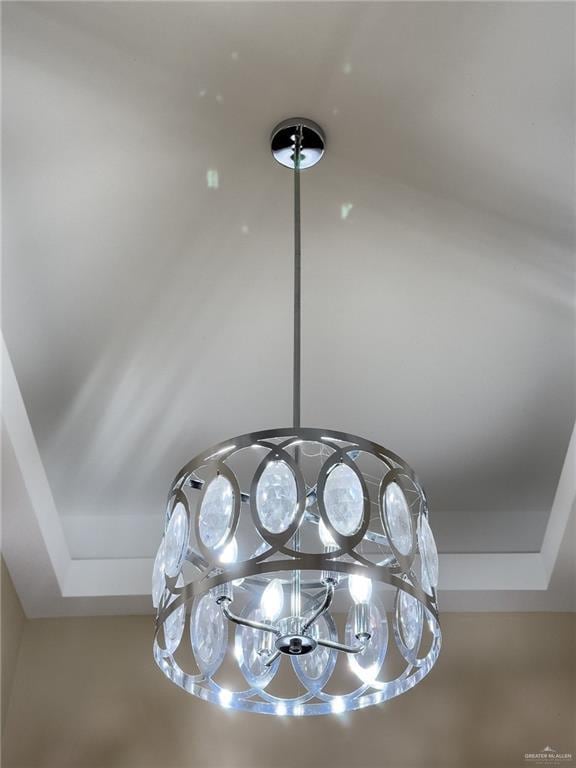 1419 Frente Al Mar Dr, Weslaco, TX 78596 - details featuring a notable chandelier and a tray ceiling