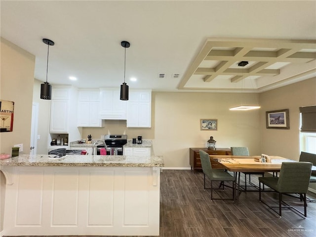 1419 Frente Al Mar Dr, Weslaco, TX 78596 - kitchen featuring dark wood-style floors, coffered ceiling, white cabinetry, and electric range