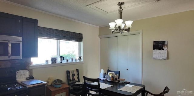 2219 Ella Ave, Harlingen, TX 78550 - dining area featuring a chandelier, crown molding, and a textured ceiling