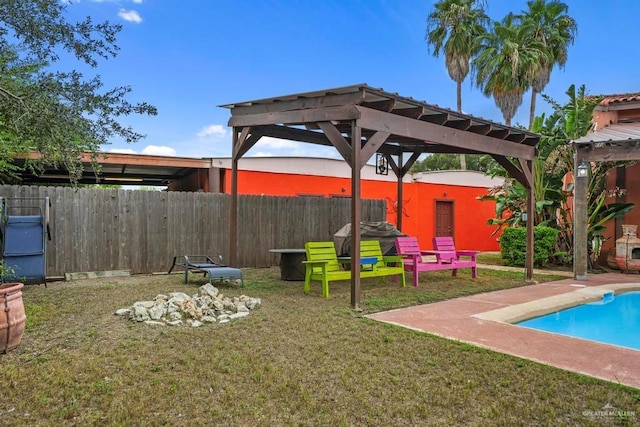 exterior space with a pergola and a fenced in pool