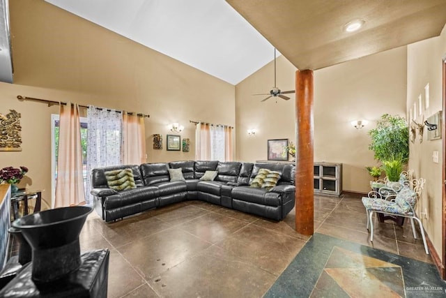 living room featuring ceiling fan and high vaulted ceiling