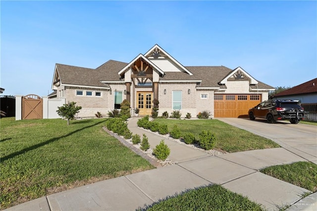 13801 N 37th St, Mcallen, TX 78504 - craftsman house featuring driveway, a gate, a garage, brick siding, and french doors