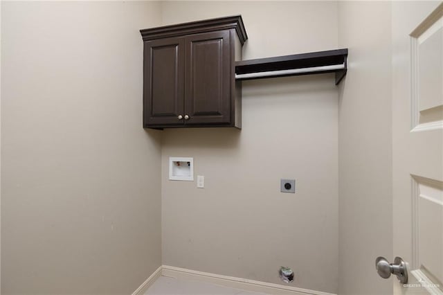 washroom featuring hookup for a washing machine, hookup for an electric dryer, and baseboards