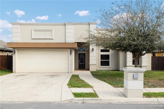 view of front of house with concrete driveway, fence, a garage, and stucco siding