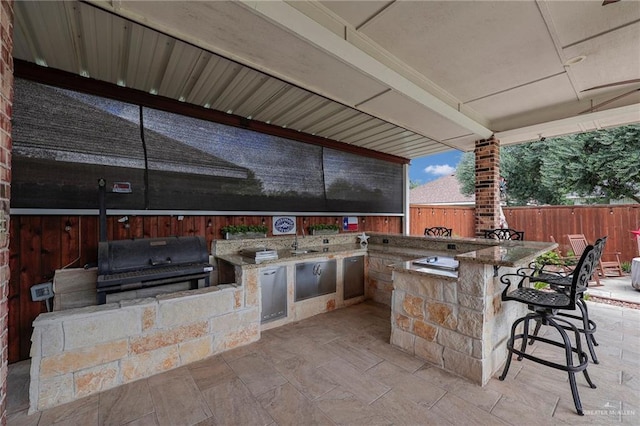 3601 Stratosphere Dr, Edinburg, TX 78539 - view of patio / terrace with an outdoor kitchen