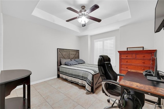 3601 Stratosphere Dr, Edinburg, TX 78539 - bedroom featuring a tray ceiling, an office area, a ceiling fan, and light tile patterned floors