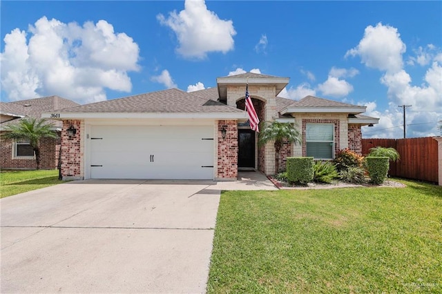 3601 Stratosphere Dr, Edinburg, TX 78539 - single story home with a garage, brick siding, and driveway