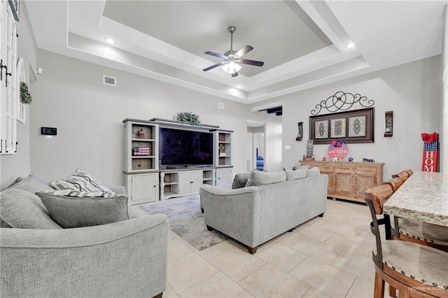 3601 Stratosphere Dr, Edinburg, TX 78539 - living area featuring a tray ceiling, a ceiling fan, light tile patterned flooring, and recessed lighting
