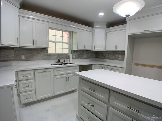 kitchen with tasteful backsplash and sink