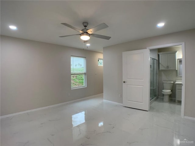 unfurnished room with ceiling fan