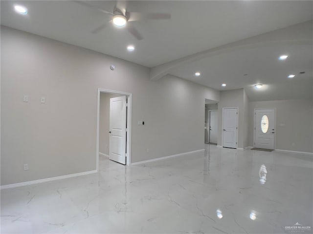 unfurnished room featuring ceiling fan