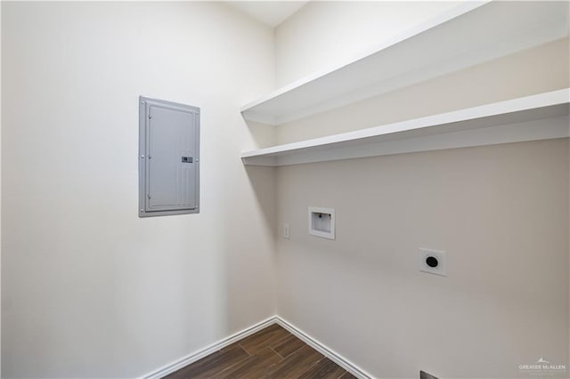 clothes washing area featuring washer hookup, dark wood-style flooring, hookup for an electric dryer, laundry area, and electric panel