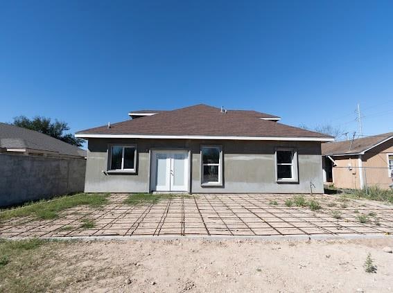 rear view of property featuring a patio area