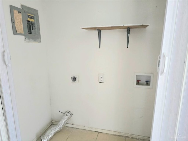 clothes washing area with tile patterned flooring, laundry area, hookup for a washing machine, and hookup for an electric dryer