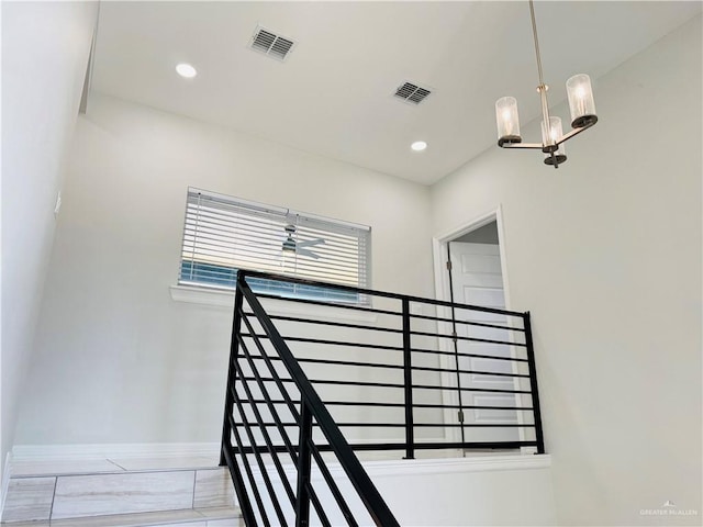 5512 N Crown Pt, Pharr, TX 78577 - stairs with recessed lighting and a chandelier