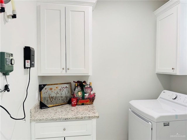 5512 N Crown Pt, Pharr, TX 78577 - washroom featuring cabinet space and independent washer and dryer