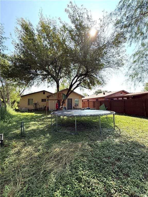 view of yard with a trampoline