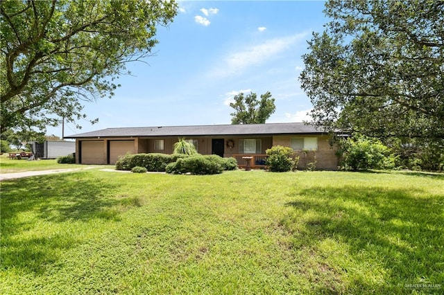 21890 Fm 508, Harlingen, TX 78550 - single story home featuring a garage, a front lawn, and driveway