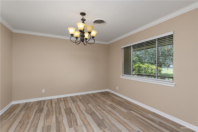 21890 Fm 508, Harlingen, TX 78550 - unfurnished room with a chandelier, ornamental molding, and light wood-style floors