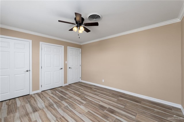 21890 Fm 508, Harlingen, TX 78550 - unfurnished bedroom featuring light wood-style floors, ornamental molding, and ceiling fan