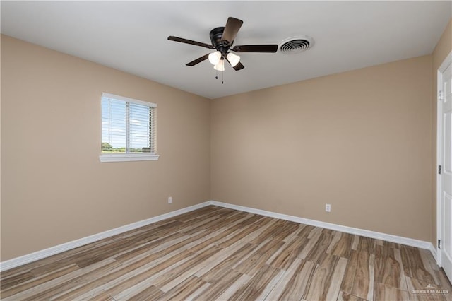 21890 Fm 508, Harlingen, TX 78550 - unfurnished room featuring light wood-style floors and ceiling fan