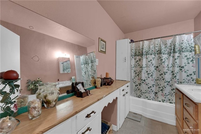 bathroom with vanity and shower / tub combo