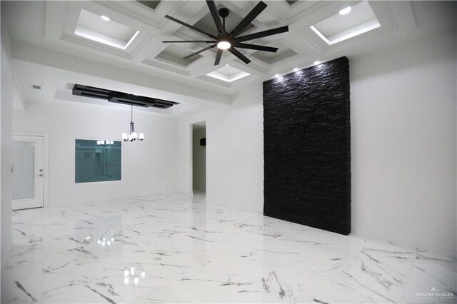 kitchen with white cabinets, light stone countertops, and sink