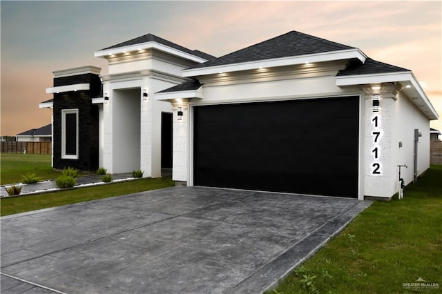 view of front of home with a yard