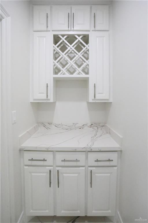 bathroom featuring vanity, toilet, and a shower with shower door