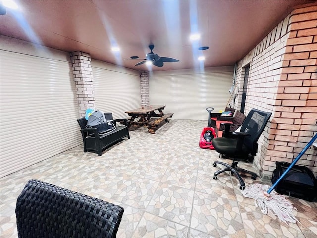 interior space with ceiling fan and outdoor dining space