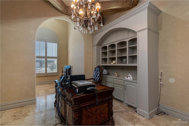 office space featuring baseboards, arched walkways, and a notable chandelier